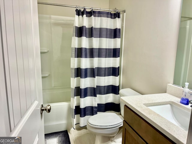 full bathroom with tile patterned flooring, vanity, shower / tub combo, and toilet