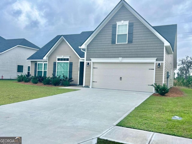 view of front facade featuring a front lawn and a garage