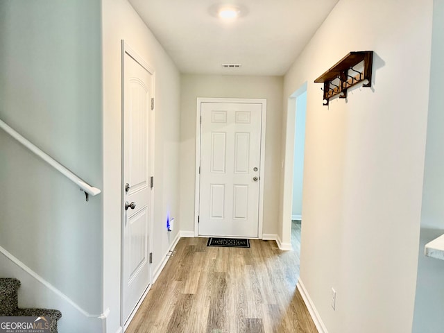 entryway with light wood-type flooring