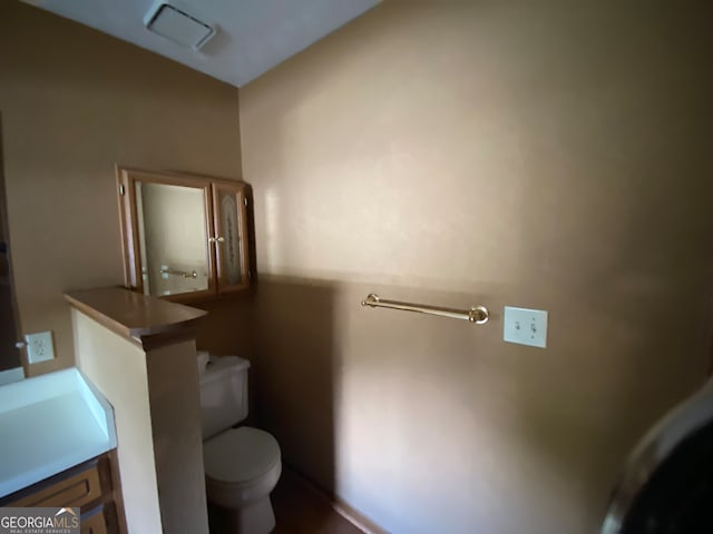 bathroom featuring toilet