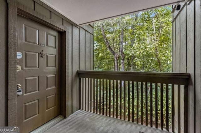 entrance to property featuring a balcony