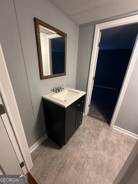 bathroom featuring hardwood / wood-style floors and vanity