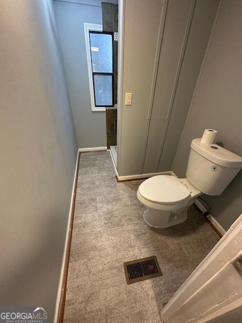 bathroom featuring toilet