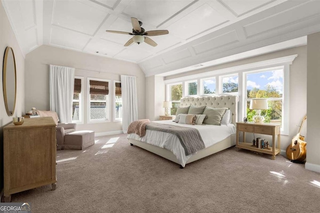 bedroom with coffered ceiling, ceiling fan, and carpet floors