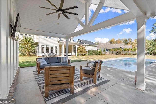 view of patio featuring ceiling fan and outdoor lounge area