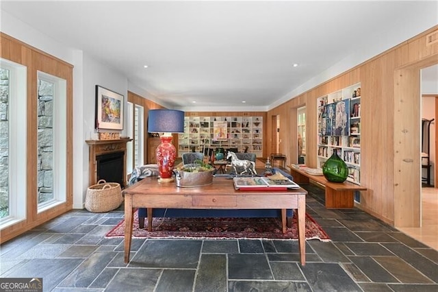 interior space featuring wood walls