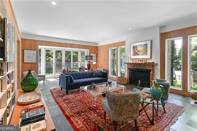 living room featuring wood walls