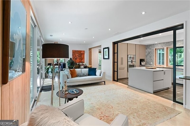 living room with light hardwood / wood-style floors