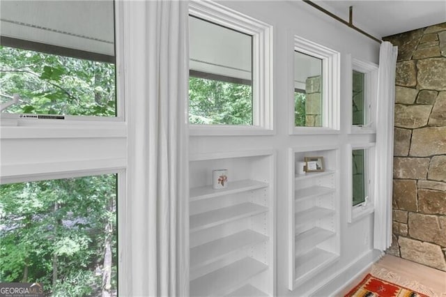 interior details featuring hardwood / wood-style floors