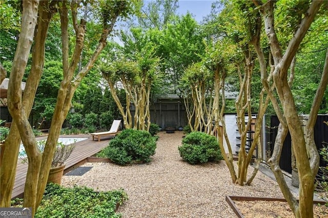 view of yard featuring a wooden deck