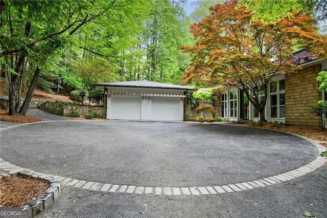 view of side of property with a garage