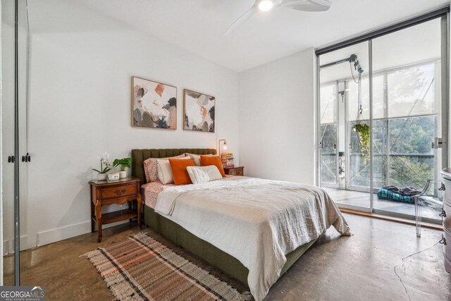 bedroom featuring access to exterior and ceiling fan