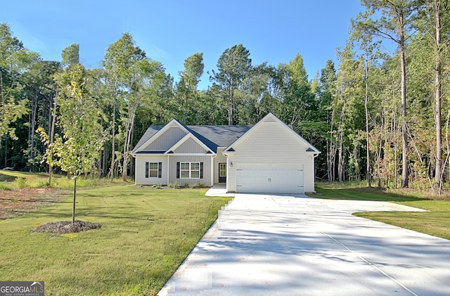 ranch-style house featuring a front yard and a garage