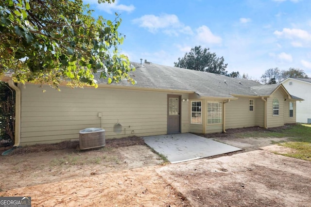 back of property featuring a patio area and cooling unit