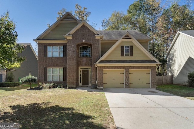 craftsman inspired home with a front yard and a garage