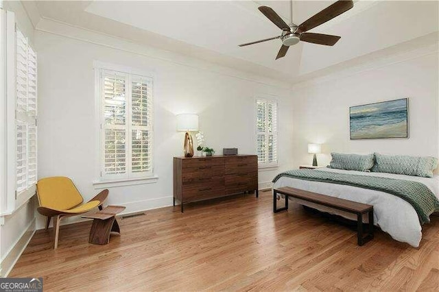 bedroom featuring ceiling fan and hardwood / wood-style floors