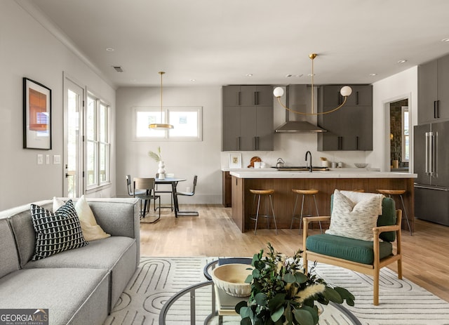 living room with light hardwood / wood-style floors