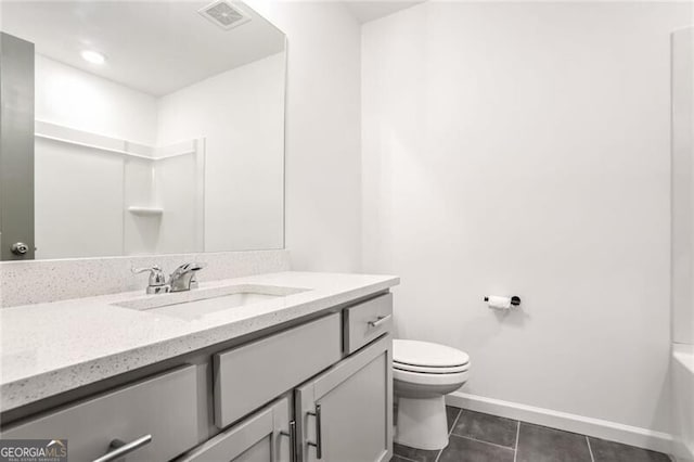 full bathroom with vanity, toilet, bathtub / shower combination, and tile patterned flooring