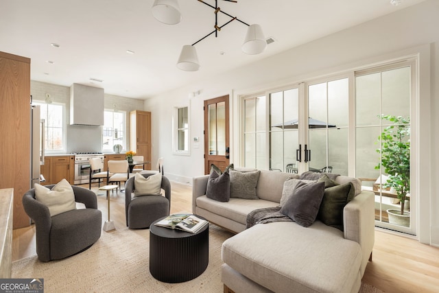 living room featuring light wood-type flooring