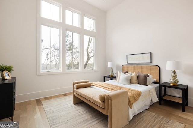 bedroom with light wood-type flooring