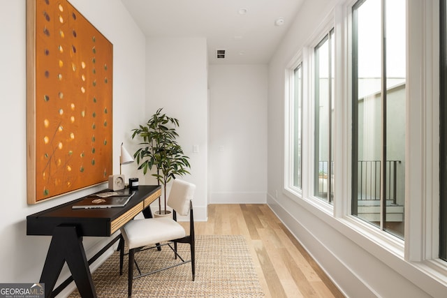 office space featuring light wood-type flooring