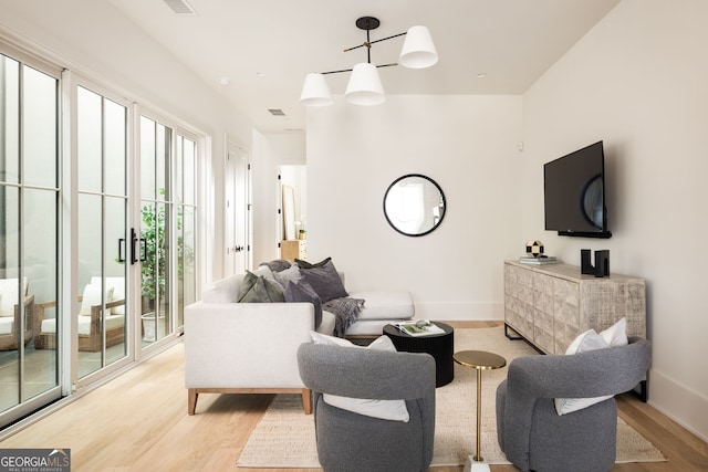 living room with light hardwood / wood-style floors