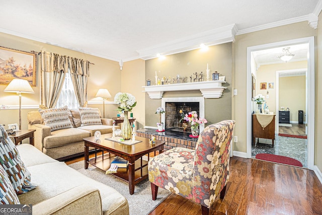 living room featuring dark wood-type flooring and crown molding