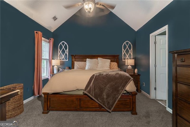 carpeted bedroom with ceiling fan and lofted ceiling