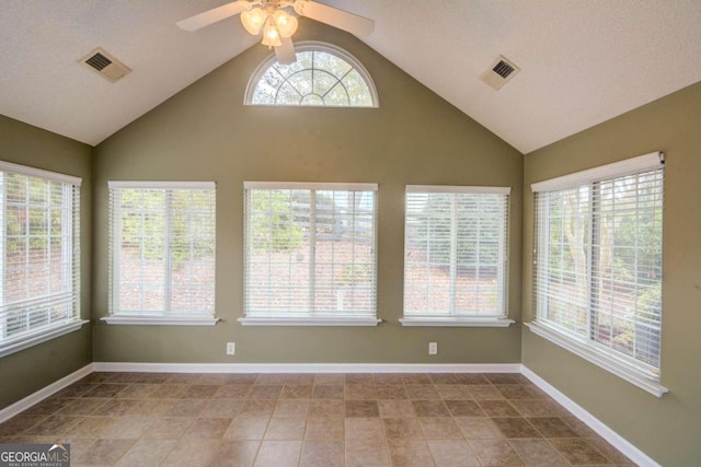 unfurnished sunroom featuring vaulted ceiling and ceiling fan