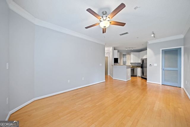 unfurnished living room featuring light hardwood / wood-style floors, ceiling fan, and crown molding