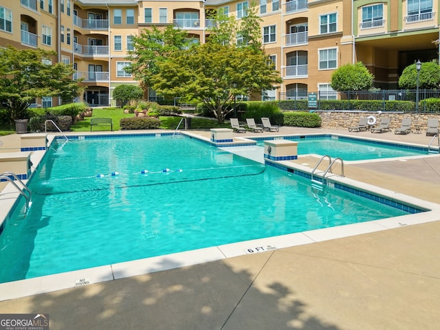 view of pool with a patio