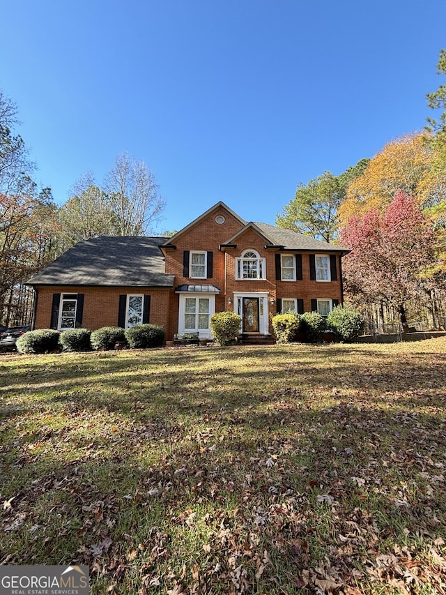 view of front of home with a front yard