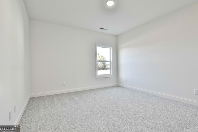 unfurnished room with carpet