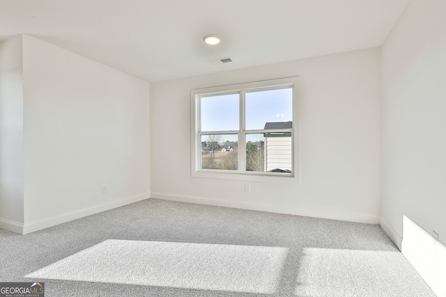 empty room featuring carpet floors