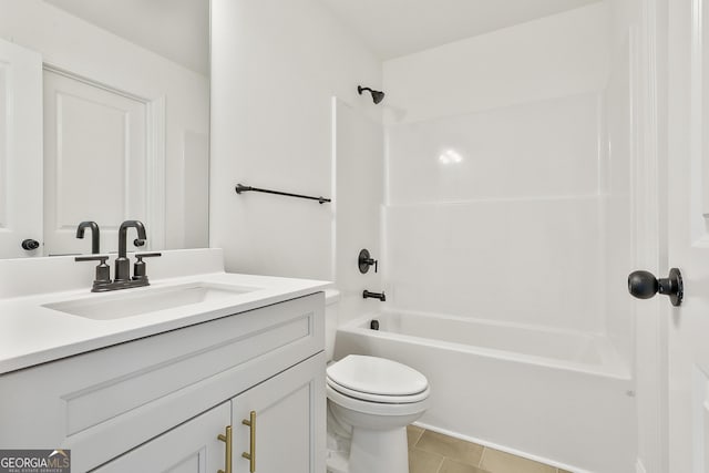 full bathroom featuring tile patterned floors, vanity, toilet, and tub / shower combination