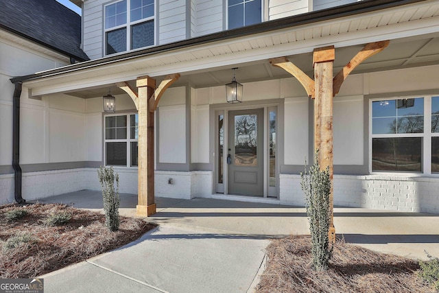 doorway to property with a porch