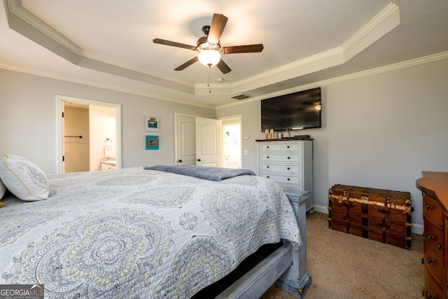 bedroom featuring carpet, ceiling fan, a raised ceiling, and crown molding