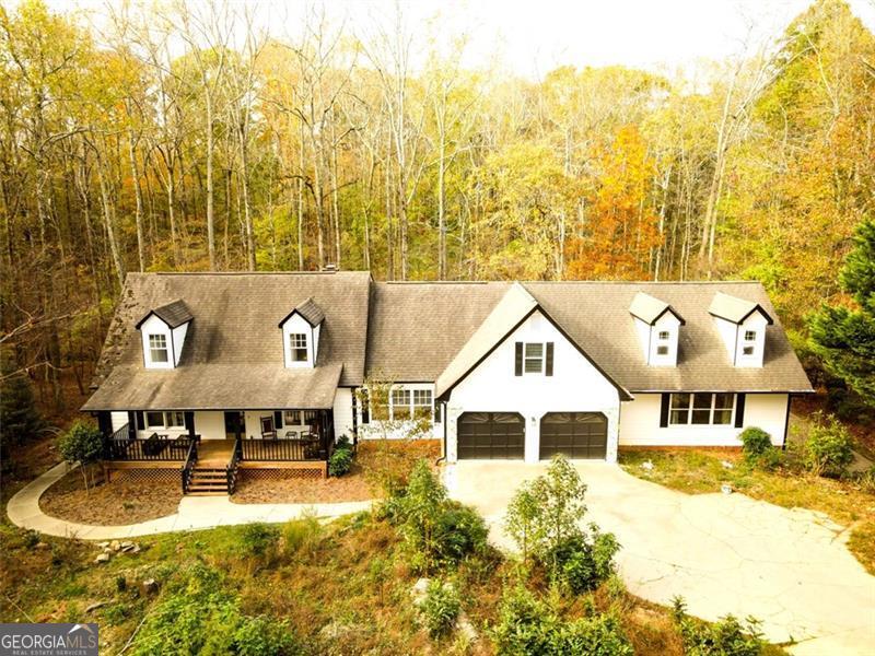 cape cod house with a porch