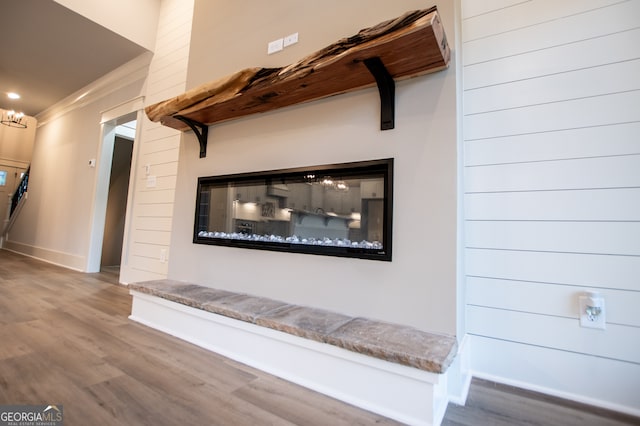 interior details featuring hardwood / wood-style flooring