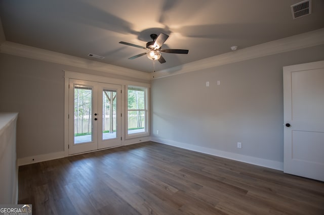 unfurnished room featuring ceiling fan, crown molding, dark hardwood / wood-style flooring, and french doors