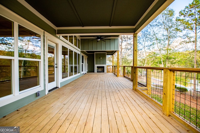 wooden deck with ceiling fan