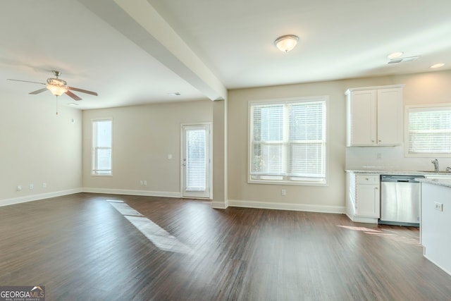 kitchen with sink, white cabinetry, ceiling fan, stainless steel dishwasher, and dark hardwood / wood-style floors