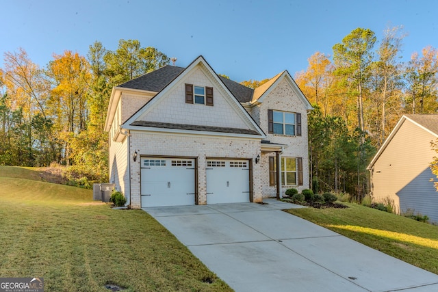 view of front facade featuring a front yard and a garage