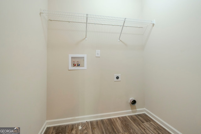 laundry area featuring electric dryer hookup, hardwood / wood-style floors, and hookup for a washing machine