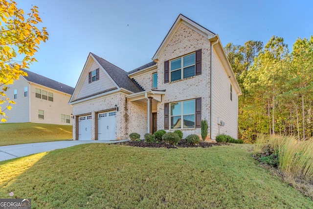 view of front of house with a garage and a front lawn