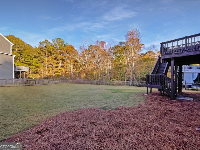 view of yard featuring a wooden deck