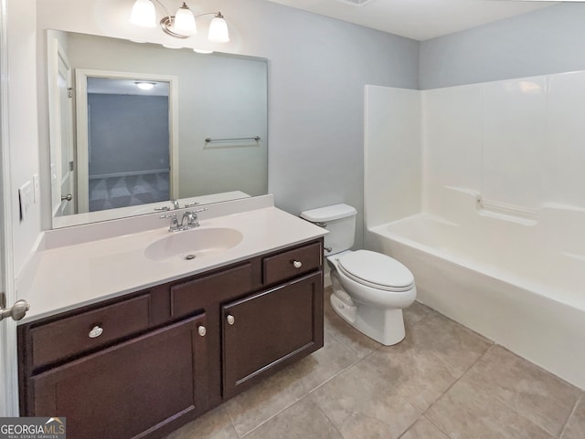 full bathroom with tile patterned floors, vanity, toilet, and shower / washtub combination