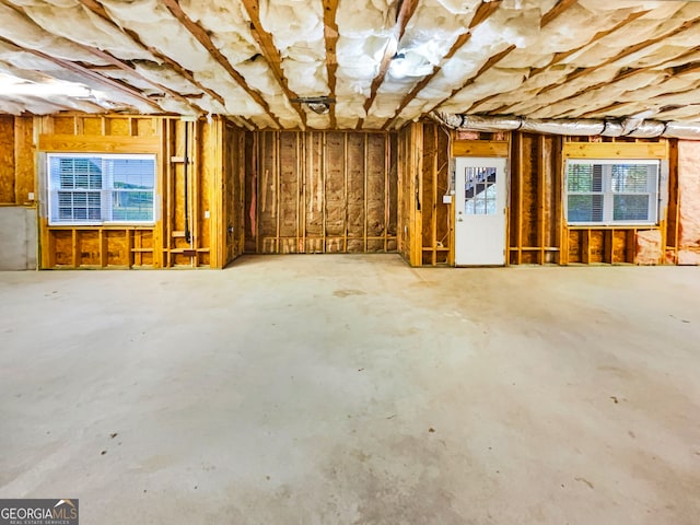 misc room featuring concrete floors and a healthy amount of sunlight