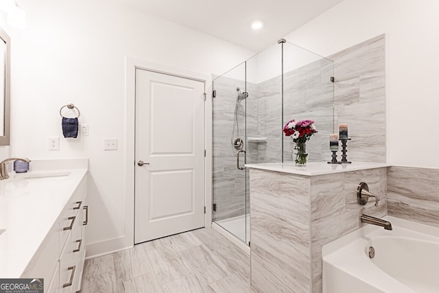 bathroom with vanity and plus walk in shower