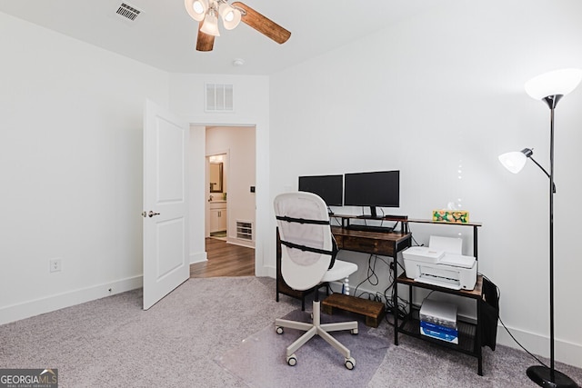 office area featuring hardwood / wood-style floors and ceiling fan